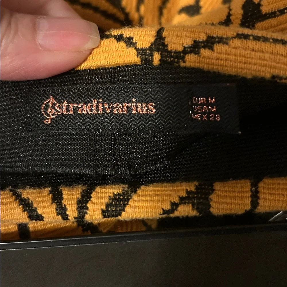 Stradivarius A-Line Mini Skirt Size Medium In Orange with Black Leaf Pattern